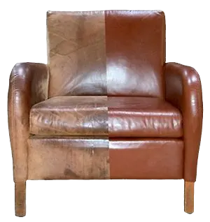 Club chair shown half damaged and half restored