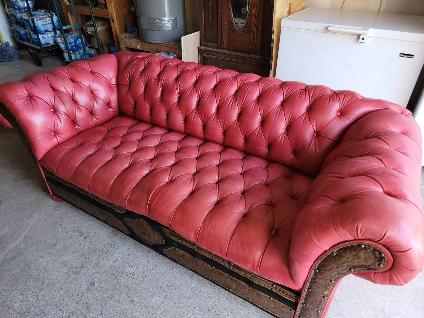 After: Red chesterfield sofa revival