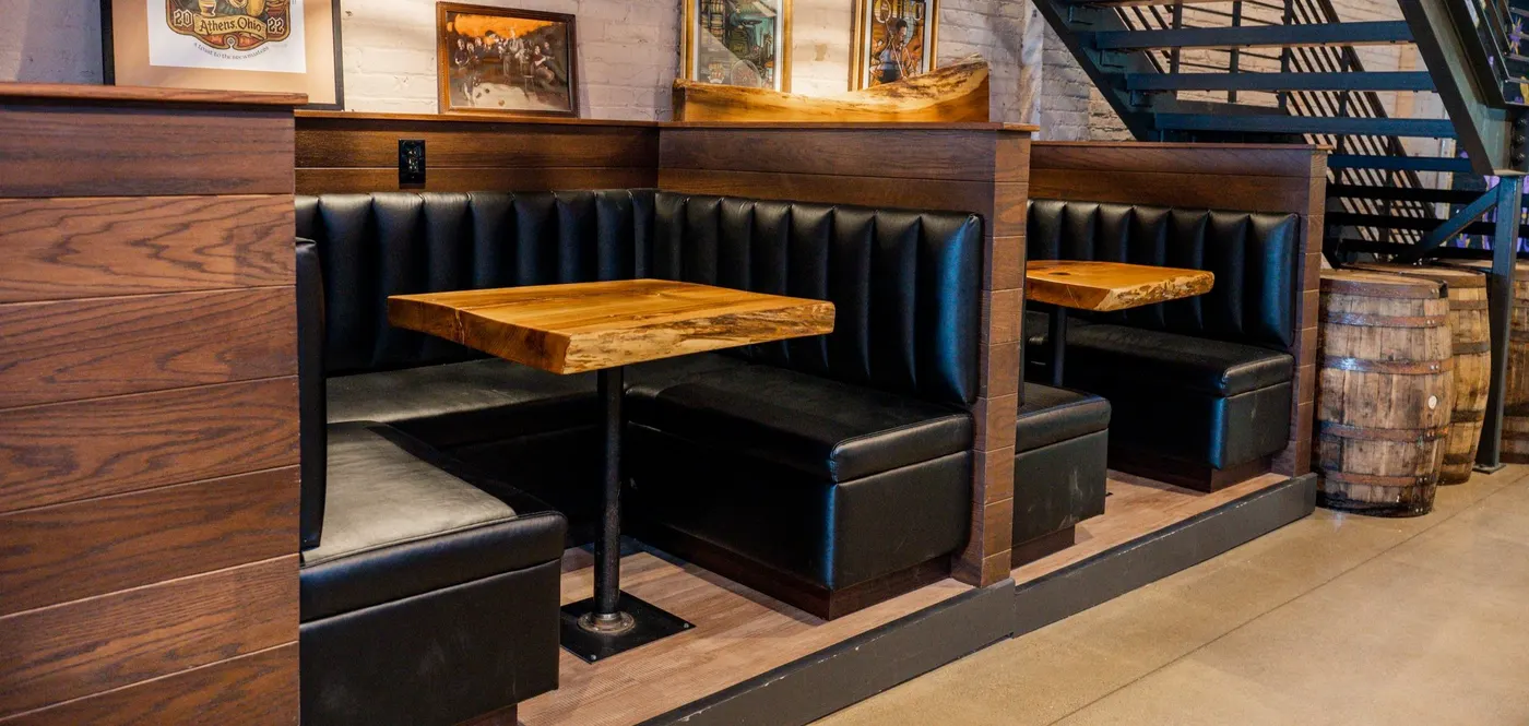 Restaurant booths kept guest-ready by off-hours repair