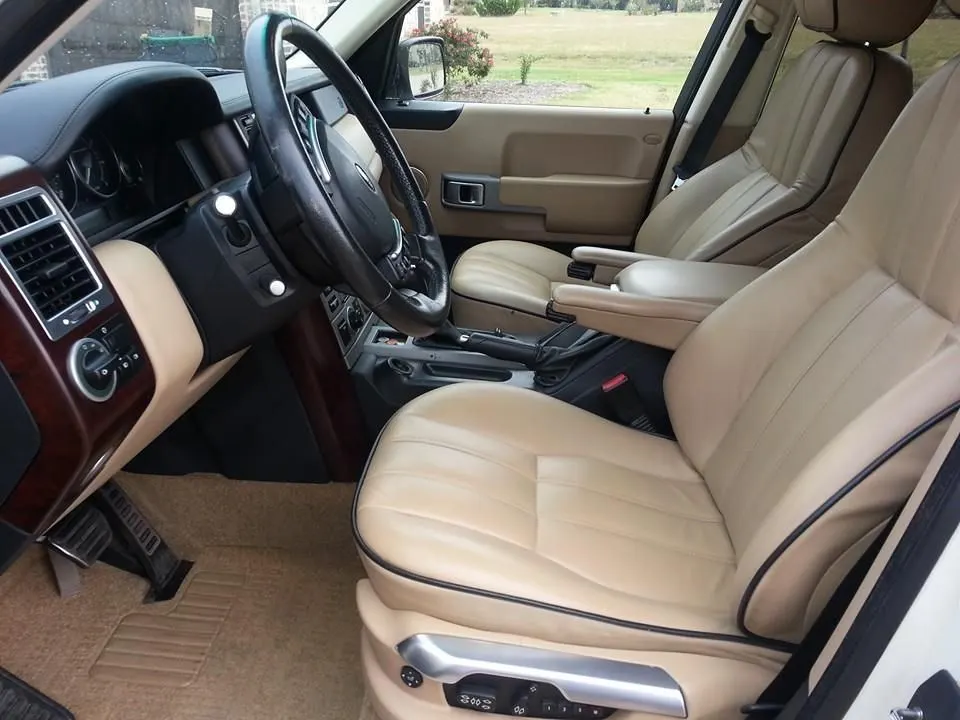Repaired tan leather automotive interior